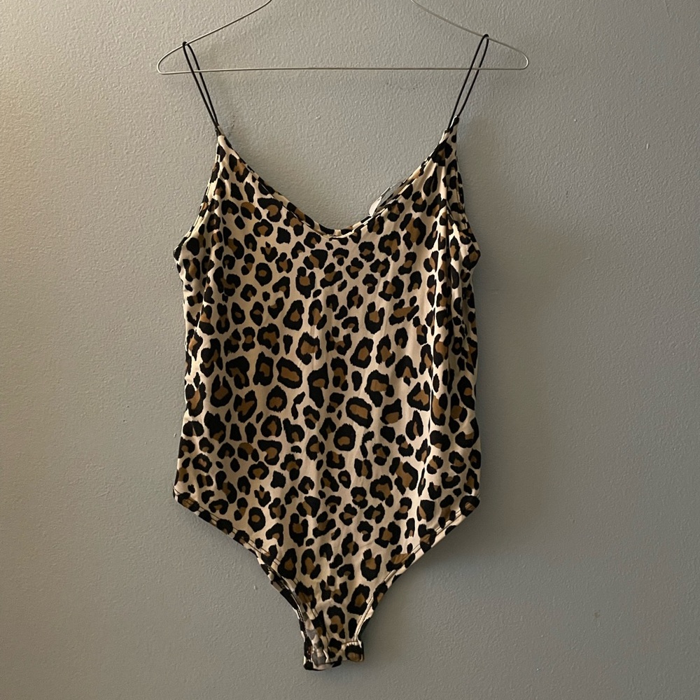 Leopard snap crotch body suit by GAZE. Size M.